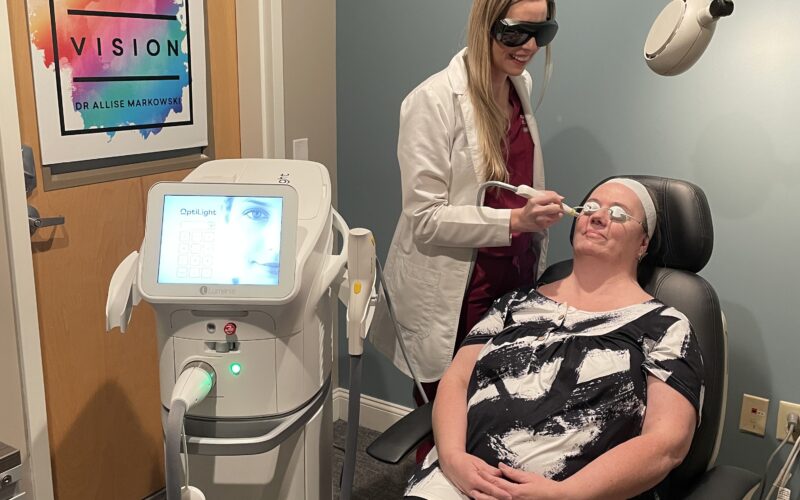 Dr. Allise Markowski performing an intense pulsed light treatment on a patient in her cold-start practice.