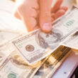 Money illustrating owner compensation