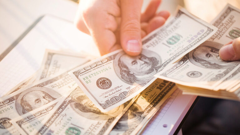 Money illustrating owner compensation