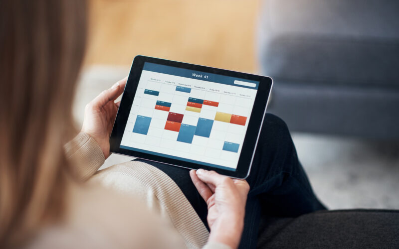 Schedule on tablet showing time reserved for activities like administrative work.