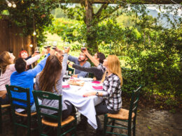 People toasting as if to show toasting freedom of independent eyewear and eye care