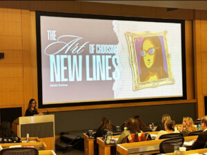 Mikki Collins delivers a presentation on how to choose new frame lines.