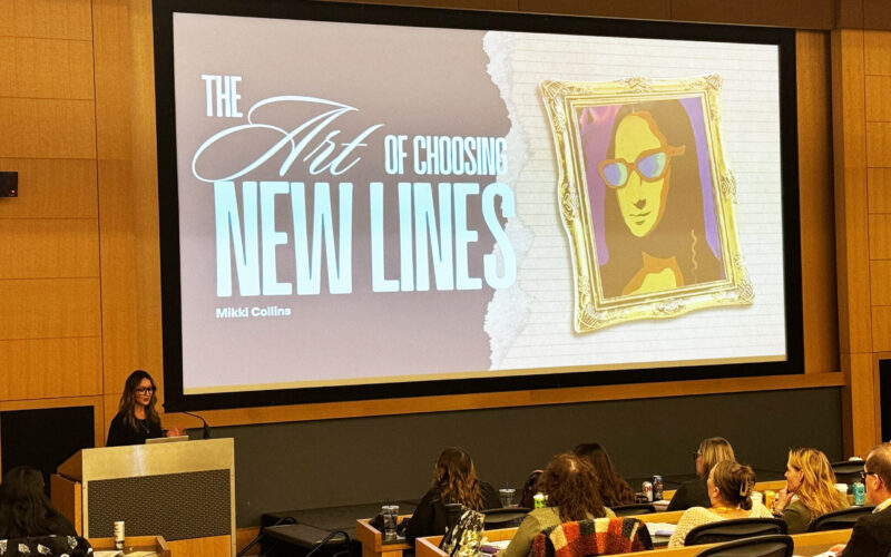 Mikki Collins delivers a presentation on how to choose new frame lines.
