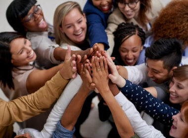 A big team going in for a group high five