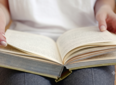 A woman flipping the page, symbolizing a new chapter
